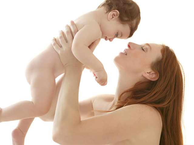 nude baby and mother portrait hug playing